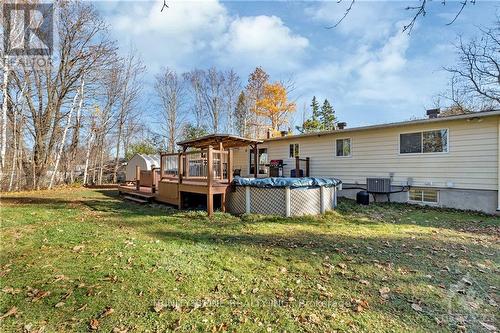 6366 Rothbourne Road, Ottawa, ON - Outdoor With Above Ground Pool