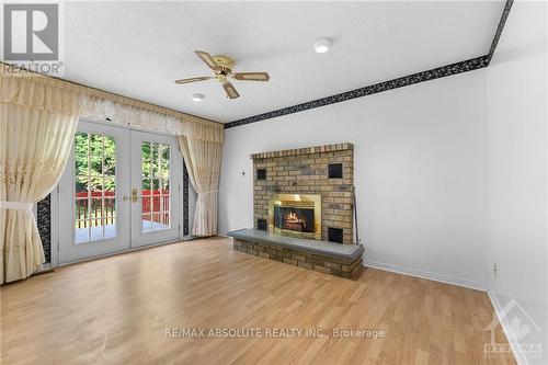 5 Rockwood Drive, Mcnab/Braeside, ON - Indoor Photo Showing Living Room With Fireplace