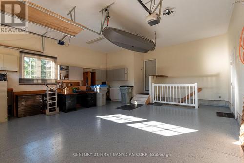 Double Car Garage Epoxy Floor - 377 Darcy Drive S, Strathroy-Caradoc (Ne), ON - Indoor Photo Showing Garage