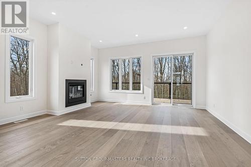 1633 Boardwalk Drive, Kingston (City Northwest), ON - Indoor Photo Showing Living Room With Fireplace