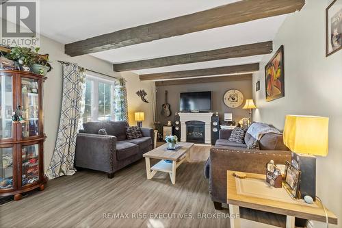 311 Simmons Road, Loyalist (Lennox And Addington - South), ON - Indoor Photo Showing Living Room With Fireplace