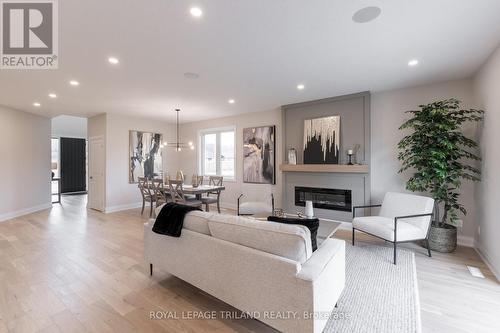 4 Allister Drive, Middlesex Centre (Kilworth), ON - Indoor Photo Showing Living Room With Fireplace