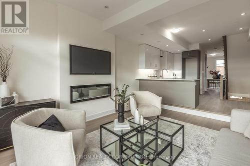 36 B - 21 Innes Avenue, Toronto, ON - Indoor Photo Showing Living Room With Fireplace