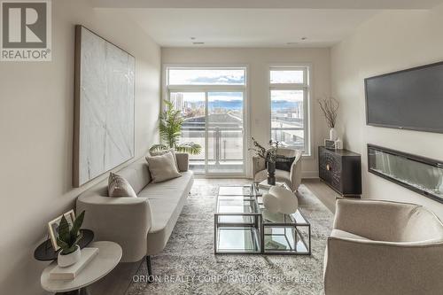 36 B - 21 Innes Avenue, Toronto, ON - Indoor Photo Showing Living Room With Fireplace