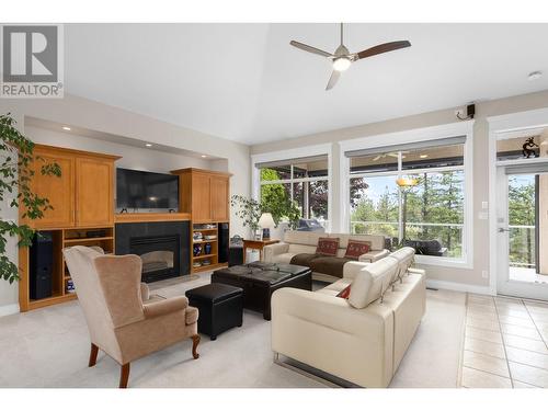 916 Skeena Drive, Kelowna, BC - Indoor Photo Showing Living Room With Fireplace