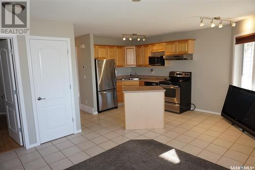 4034 Buckingham Drive E, Regina, SK - Indoor Photo Showing Kitchen With Stainless Steel Kitchen With Double Sink