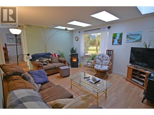 705 Giffin Avenue, Slocan, BC - Indoor Photo Showing Living Room With Fireplace