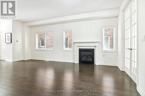 3946 Tufgar Crescent, Burlington, ON - Indoor Photo Showing Living Room With Fireplace