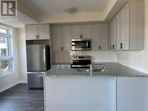 123 - 1573 Rose Way, Milton, ON - Indoor Photo Showing Kitchen With Stainless Steel Kitchen With Double Sink With Upgraded Kitchen