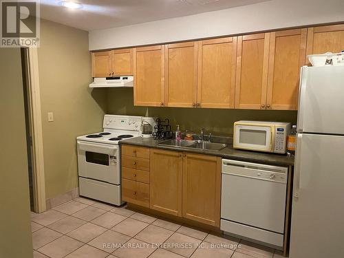 1001 - 1140 Parkwest Place, Mississauga, ON - Indoor Photo Showing Kitchen With Double Sink