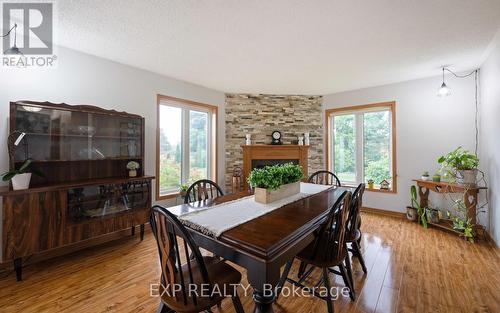 254304 9Th Line, Amaranth, ON - Indoor Photo Showing Dining Room With Fireplace