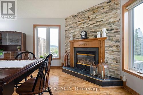 254304 9Th Line, Amaranth, ON - Indoor Photo Showing Living Room With Fireplace