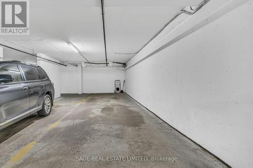 107 - 20 Guildwood Parkway, Toronto, ON - Indoor Photo Showing Garage