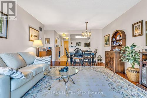 107 - 20 Guildwood Parkway, Toronto, ON - Indoor Photo Showing Living Room With Fireplace