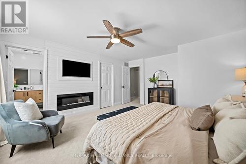 194 Thames Way, Hamilton, ON - Indoor Photo Showing Bedroom With Fireplace