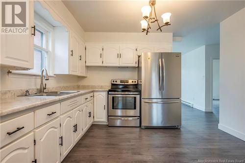 23 Clearview Street, Moncton, NB - Indoor Photo Showing Kitchen With Double Sink