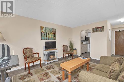 6612 Thornberry Unit# 201, Windsor, ON - Indoor Photo Showing Living Room With Fireplace