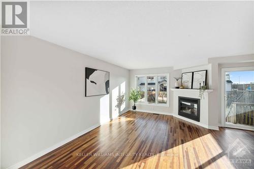 324 Balinroan Crescent, Ottawa, ON - Indoor Photo Showing Living Room With Fireplace