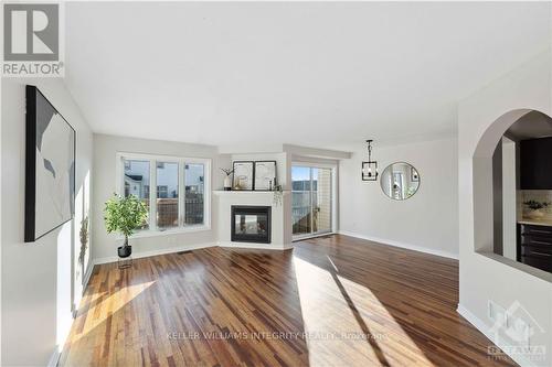 324 Balinroan Crescent, Ottawa, ON - Indoor Photo Showing Living Room With Fireplace