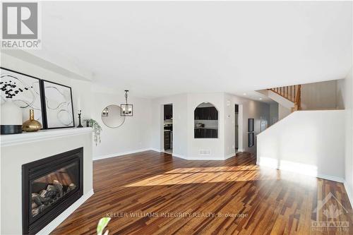 324 Balinroan Crescent, Ottawa, ON - Indoor Photo Showing Living Room With Fireplace