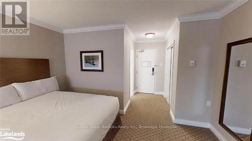 317 - 1235 Deerhurst Drive, Huntsville (Chaffey), ON - Indoor Photo Showing Bedroom