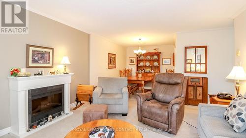 305 - 131 Clapperton Street, Barrie, ON - Indoor Photo Showing Living Room With Fireplace