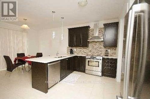 1066 Savoline Boulevard, Milton, ON - Indoor Photo Showing Kitchen With Stainless Steel Kitchen With Upgraded Kitchen