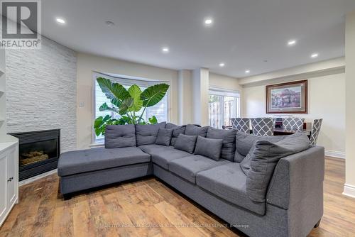 19 - 2880 Headon Forest Drive, Burlington, ON - Indoor Photo Showing Living Room With Fireplace