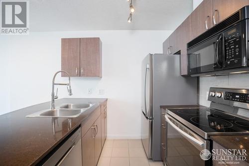 914 610 Granville Avenue, Vancouver, BC - Indoor Photo Showing Kitchen With Stainless Steel Kitchen With Double Sink