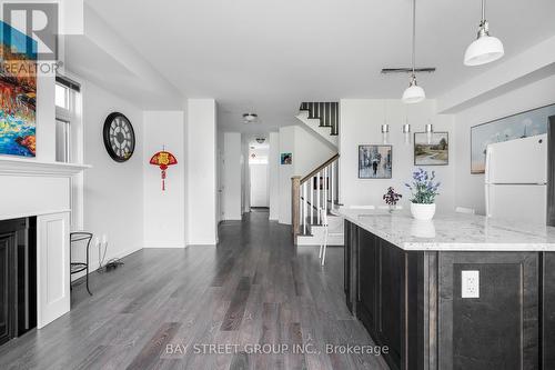 142 Yellow Birch Crescent, Blue Mountains, ON - Indoor Photo Showing Kitchen With Fireplace With Upgraded Kitchen