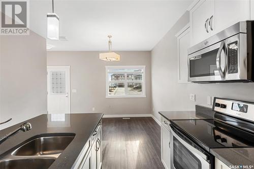 1113 Kolynchuk Link, Saskatoon, SK - Indoor Photo Showing Kitchen With Double Sink