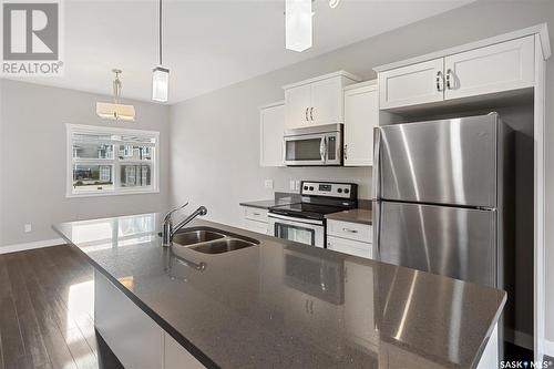 1113 Kolynchuk Link, Saskatoon, SK - Indoor Photo Showing Kitchen With Double Sink With Upgraded Kitchen