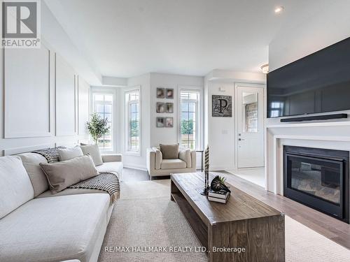 4023 Sixth Line, Oakville, ON - Indoor Photo Showing Living Room With Fireplace