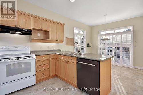 243 - 2025 Meadowgate Boulevard, London, ON - Indoor Photo Showing Kitchen With Double Sink