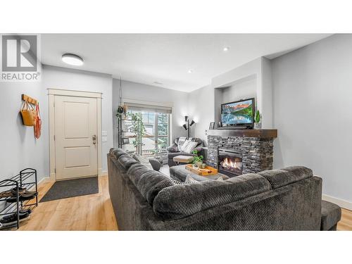 1904 Pineridge Mountain Link Unit# 12, Invermere, BC - Indoor Photo Showing Living Room With Fireplace