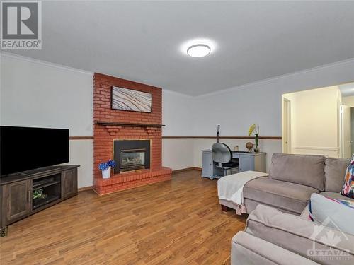 6337 Viseneau Drive, Ottawa, ON - Indoor Photo Showing Living Room With Fireplace