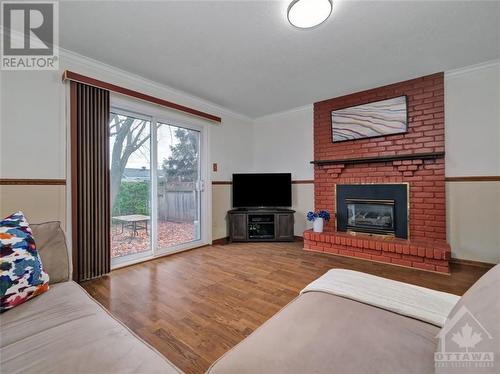 6337 Viseneau Drive, Ottawa, ON - Indoor Photo Showing Living Room With Fireplace