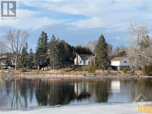 View from across the river - 5328 Kilby Lane, Manotick, ON - Outdoor With Body Of Water With View