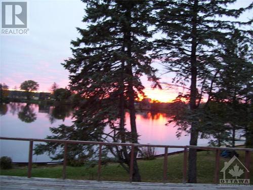 Western Sunset - 5328 Kilby Lane, Manotick, ON - Outdoor With Body Of Water With View