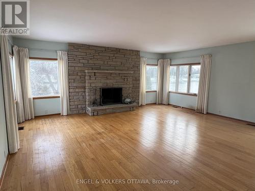 5328 Kilby Lane, Ottawa, ON - Indoor Photo Showing Living Room With Fireplace