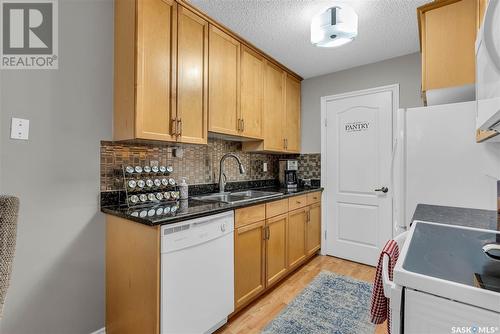 102B 1121 Mckercher Drive, Saskatoon, SK - Indoor Photo Showing Kitchen With Double Sink