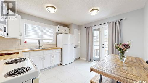 110 Petersmeyer Street, Regina, SK - Indoor Photo Showing Kitchen With Double Sink