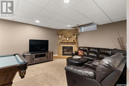 4514 Mcmillan Drive, Regina, SK - Indoor Photo Showing Basement With Fireplace