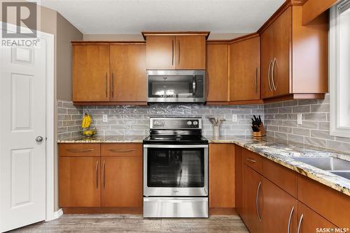 4514 Mcmillan Drive, Regina, SK - Indoor Photo Showing Kitchen With Double Sink