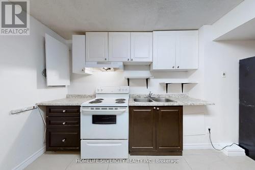 24 Norwood Place, Brampton, ON - Indoor Photo Showing Kitchen With Double Sink