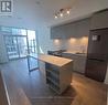 410 - 65 Annie Craig Drive, Toronto, ON  - Indoor Photo Showing Kitchen 