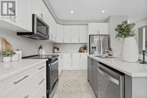 46 Broome Avenue, Clarington (Courtice), ON - Indoor Photo Showing Kitchen With Double Sink With Upgraded Kitchen