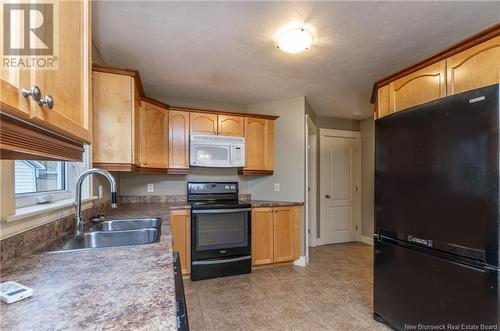 72 Rachel Street, Shediac, NB - Indoor Photo Showing Kitchen With Double Sink