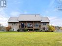 96 Huyck'S Bay Road, Prince Edward County (Wellington), ON  - Outdoor With Deck Patio Veranda With Facade 