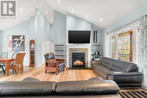 96 Huyck'S Bay Road, Prince Edward County (Wellington), ON - Indoor Photo Showing Living Room With Fireplace